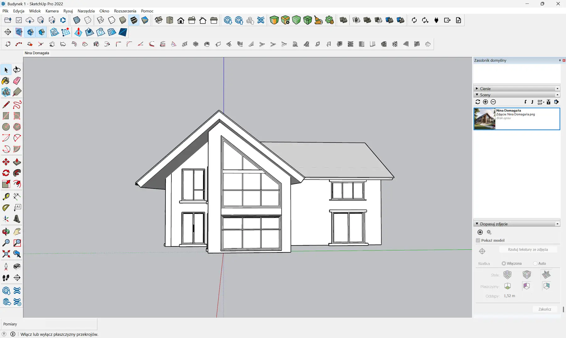 SketchUp model viewed straight on to the gable elevation, white massing with window divisions, program interface visible